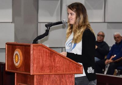 Colleen Henn, who is from East Hampton, represented the Surfrider Foundation of New York City, Central Long Island, and Eastern Long Island at a hearing on Friday on a plan to open waters off the Atlantic Coast to offshore oil and gas exploration. Colleen Henn, who is from East Hampton, represented the Surfrider Foundation of New York City, Central Long Island, and Eastern Long Island at a hearing on Friday on a plan to open waters off the Atlantic Coast to offshore oil and gas exploration.