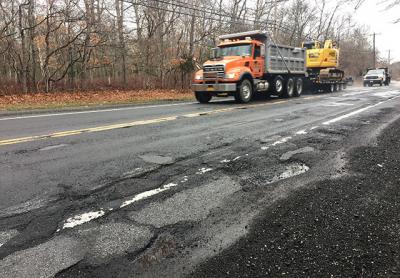 This ravaged section of Route 114 north of Stephen Hand’s Path in East Hampton is one of eight portions of the roadway that will be resurfaced this year. This ravaged section of Route 114 north of Stephen Hand’s Path in East Hampton is one of eight portions of the roadway that will be resurfaced this year.