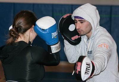 Richie Daunt, sparring with one of his Montauk Playhouse students, Caryn Freiberger, above, also is teaching at MuvStrong in the One-Stop complex, and at the Ideal Living studio at the Albatross motel in Montauk. Richie Daunt, sparring with one of his Montauk Playhouse students, Caryn Freiberger, above, also is teaching at MuvStrong in the One-Stop complex, and at the Ideal Living studio at the Albatross motel in Montauk.