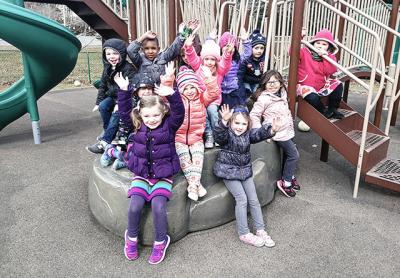 Children in the Eleanor Whitmore Early Childhood Center's prekindergarten program enjoyed time on the playground Monday after the regular school day was over. Children in the Eleanor Whitmore Early Childhood Center's prekindergarten program enjoyed time on the playground Monday after the regular school day was over.