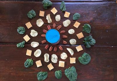 A mandala of foods celebrated this month, from the healthy (spinach) to the not so (potato chips). A mandala of foods celebrated this month, from the healthy (spinach) to the not so (potato chips).