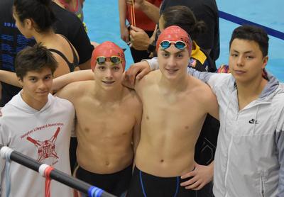 Joey Badilla, Jack Duryea, Owen McCormac, and Fernando Menjura set a state record in the 13-14 boys 200 medley relay — one of eight state records the Hurricanes set in Buffalo last weekend.