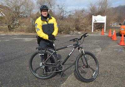 East Hampton Town Police Sgt. Dan Roman with one of two state-of-the-art patrol bicycles, now part of the department’s fleet East Hampton Town Police Sgt. Dan Roman with one of two state-of-the-art patrol bicycles, now part of the department’s fleet