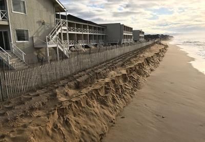 Higher-than-normal tides and a strong easterly sweep of surf earlier this week scoured the contours of the sand that had been placed between the ocean and the sandbags along the downtown Montauk beach. Higher-than-normal tides and a strong easterly sweep of surf earlier this week scoured the contours of the sand that had been placed between the ocean and the sandbags along the downtown Montauk beach.