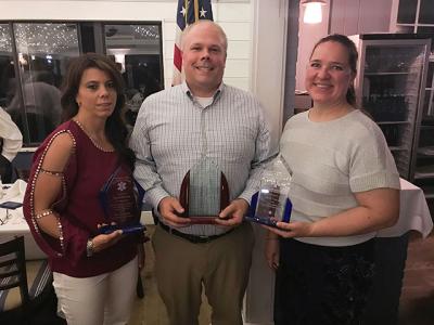 Mark Poitras received not one, but two awards from the Southampton Town EMS Advisory Committee’s dinner at the Coast Grill Friday night. He took home the Nancy Makson Award of Excellence and the Ralph Oswald Distinction for Inspirational Leadership. Pictured with him is Stacy McGowin, the Sag Harbor Volunteer Ambulance Corps Chief, and Violetta Zamorski, the head of the EMS Advisory Committee. Mark Poitras received not one, but two awards from the Southampton Town EMS Advisory Committee’s dinner at the Coast Grill Friday night. He took home the Nancy Makson Award of Excellence and the Ralph Oswald Distinction for Inspirational Leadership. Pictured with him is Stacy McGowin, the Sag Harbor Volunteer Ambulance Corps Chief, and Violetta Zamorski, the head of the EMS Advisory Committee.