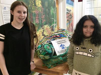 Sarah Betuel, left, and Maya Guzman, East Hampton Middle School students, are spearheading an environmental initiative launched by the Surfrider Foundation in which they plan to appeal to East Hampton restaurants and bars to go straw-free for the summer. Sarah Betuel, left, and Maya Guzman, East Hampton Middle School students, are spearheading an environmental initiative launched by the Surfrider Foundation in which they plan to appeal to East Hampton restaurants and bars to go straw-free for the summer.
