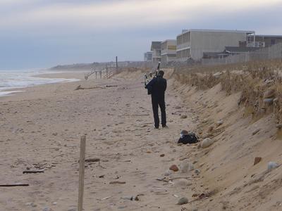 A bagpiper practiced earlier this year on the Montauk ocean beach, the future of which is being considered in a new town study of shoreline policy on the threat from climate change and other forces. A bagpiper practiced earlier this year on the Montauk ocean beach, the future of which is being considered in a new town study of shoreline policy on the threat from climate change and other forces.