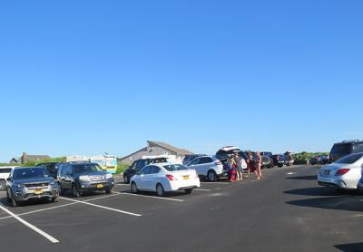 The East Hampton Town Board adopted new regulations for parking at the lots serving the ocean beach at Ditch Plain in Montauk last week. The East Hampton Town Board adopted new regulations for parking at the lots serving the ocean beach at Ditch Plain in Montauk last week.