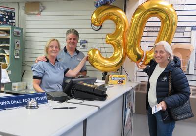 Bruce Howard, who has worked at the Montauk Post Office for 28 years, celebrated 30 years with the United States Postal Service on Monday with his co-worker Jeanne Stevens and a postal patron, Judy Morton. Bruce Howard, who has worked at the Montauk Post Office for 28 years, celebrated 30 years with the United States Postal Service on Monday with his co-worker Jeanne Stevens and a postal patron, Judy Morton.
