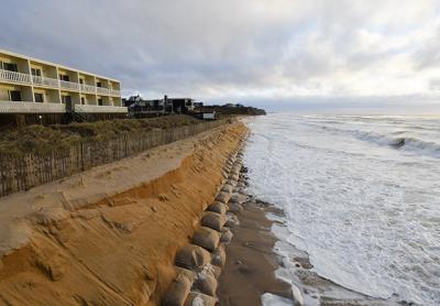 On Sunday, waves lapped at the downtown Montauk oceanfront, where erosion from recent storms has carried away sand and exposed the sandbags beneath it. A Montauk hamlet study recommends coastal retreat for oceanfront motels and a gradual shift to higher ground. On Sunday, waves lapped at the downtown Montauk oceanfront, where erosion from recent storms has carried away sand and exposed the sandbags beneath it. A Montauk hamlet study recommends coastal retreat for oceanfront motels and a gradual shift to higher ground.