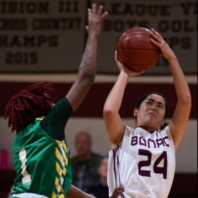 Emma Silvera (24), guarded above by Wyandanch’s Jalea Ervin, came close to making it a 1-point game in the final minute, but her 3-point attempt rolled off the rim.