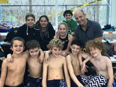 Among the 34 competitors who made a recent trip to the Winterfest meet at the University of Maryland were these young swimmers shown above with the Hurricanes’ coach, Tom Cohill. Bottom row: Jasiu Gredysa, Nick Chavez, Miles Menu, Liam Knight, and Ben Kriegsman. Top row: Elizabeth Daniels, Lylah Metz, Daisy Pitches, and Patrick O’Donnell.