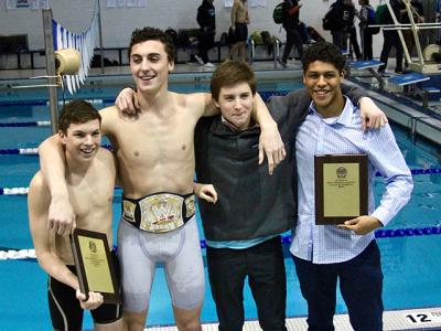 The four captains of the East Hampton boys swimming team, Ryan Duryea, Ethan McCormac, Ryan Bahel, and Jordan Uribe, posed afterward with the team’s plaques. The four captains of the East Hampton boys swimming team, Ryan Duryea, Ethan McCormac, Ryan Bahel, and Jordan Uribe, posed afterward with the team’s plaques.