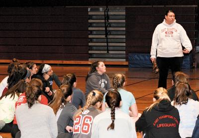 Annemarie Cangiolosi Brown, at right, is carrying on a family tradition as she takes over as coach of the East Hampton High School softball team.