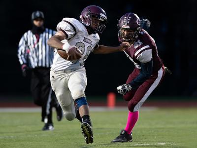 Christian Johnson, left, scored three touchdowns in a game last fall against the archrival Southampton Mariners. Christian Johnson, left, scored three touchdowns in a game last fall against the archrival Southampton Mariners.