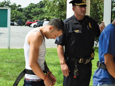 William Crespo-Duran, seen here being led into East Hampton Town Justice Court back in August, will face a Suffolk County Criminal Court judge in April for sentencing on charges related to a Montauk drug bust last summer. William Crespo-Duran, seen here being led into East Hampton Town Justice Court back in August, will face a Suffolk County Criminal Court judge in April for sentencing on charges related to a Montauk drug bust last summer.