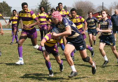 Kevin Bunce Jr., who is to play in an international youth 7s tournament in Orlando, Fla., next week, scored two tries and made good on half a dozen conversion kicks at Mattituck High School Sunday. Kevin Bunce Jr., who is to play in an international youth 7s tournament in Orlando, Fla., next week, scored two tries and made good on half a dozen conversion kicks at Mattituck High School Sunday.