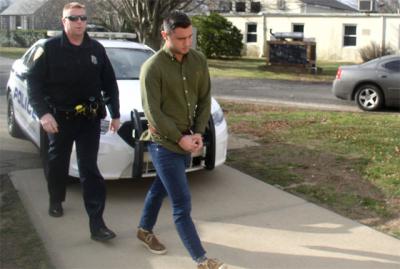 Frank Squadrito, a former butler at Ronald Perelman's Creeks estate in East Hampton, was led into East Hampton Town Justice Court on Friday. Frank Squadrito, a former butler at Ronald Perelman's Creeks estate in East Hampton, was led into East Hampton Town Justice Court on Friday.