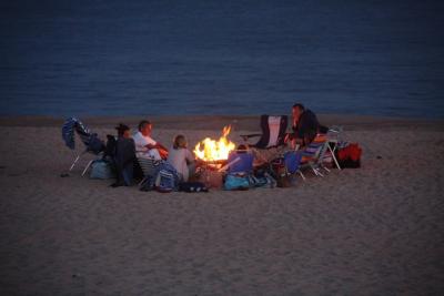 The difference between this nighttime beach scene from years past and ones today: Now, both East Hampton Town and East Hampton Village will require that beach fires be built in metal containers rather than directly on the sand.