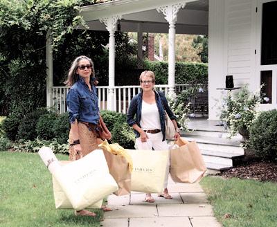 Deirdre Guest, left, and Liz Kramer of Homework “edit” the houses they stage, so that prospective buyers can imagine the house as their own.