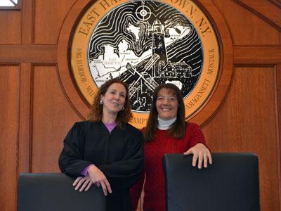 East Hampton Town Justice Catharine Cahill, left, with Jennifer Anderson, her long-time clerk, will not seek re-election this fall after 20 years on the bench. East Hampton Town Justice Catharine Cahill, left, with Jennifer Anderson, her long-time clerk, will not seek re-election this fall after 20 years on the bench.