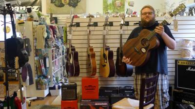 Chris Clark has helped run Crossroads Music, which will close by the end of the year. His father, Michael Clark, is the owner. Chris Clark has helped run Crossroads Music, which will close by the end of the year. His father, Michael Clark, is the owner.