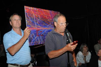 Barry Raebeck, left, and Tom McNiven displayed a image showing flight paths over the East Hampton Airport.