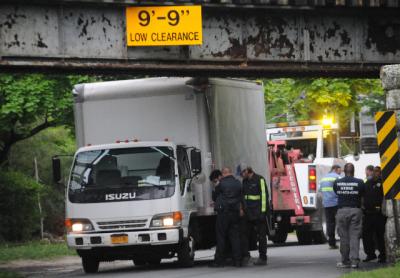 A box truck became wedged under the Accabonac Road overpass on Thursday afternoon, the second such bridge strike this week. A box truck became wedged under the Accabonac Road overpass on Thursday afternoon, the second such bridge strike this week.