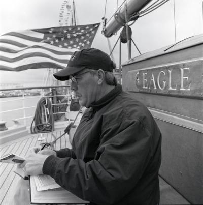 Russell Drumm writing aboard the U.S.C.G. Barque Eagle in 1996 Russell Drumm writing aboard the U.S.C.G. Barque Eagle in 1996