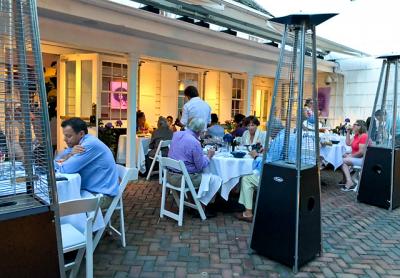 The brick patio of Maison Vivienne, which overlooks Southampton’s Main Street but is hidden behind hedges, was lively on a pleasant Tuesday evening. The brick patio of Maison Vivienne, which overlooks Southampton’s Main Street but is hidden behind hedges, was lively on a pleasant Tuesday evening.