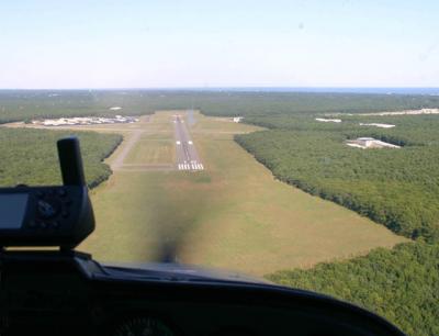 Sections of the woods on both ends of runway 10-28, across Daniel’s Hole Road from the East Hampton Town Airport, and at the runway’s end will be cut down to remove them from the Federal Aviation Administration’s required clear zone. Sections of the woods on both ends of runway 10-28, across Daniel’s Hole Road from the East Hampton Town Airport, and at the runway’s end will be cut down to remove them from the Federal Aviation Administration’s required clear zone.