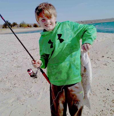 Canyon Ross hooked his first striped bass of the season at Louse Point in Springs. Canyon Ross hooked his first striped bass of the season at Louse Point in Springs.