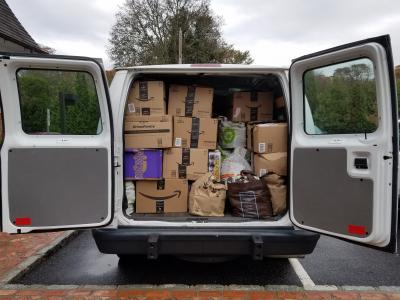 Donations from the East Hampton office of Saunders Associates for the East Hampton Food Pantry filled the back of a cargo van. A food drive at the real estate firm's various offices brought in more than 14,000 donated items. Donations from the East Hampton office of Saunders Associates for the East Hampton Food Pantry filled the back of a cargo van. A food drive at the real estate firm's various offices brought in more than 14,000 donated items.
