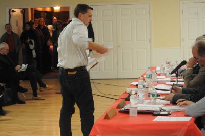 At the Nov. 24 hearing on the rental registry, Tom Steele, handed out copies of a petition opposing the registry. At the Nov. 24 hearing on the rental registry, Tom Steele, handed out copies of a petition opposing the registry.