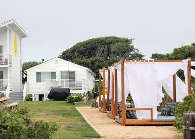 The owners of the new Hero Beach Club motel in Montauk recently added daybeds and other features to an outdoor lounge on the property. A new town law will make it impossible for guests to order food and drinks. The owners of the new Hero Beach Club motel in Montauk recently added daybeds and other features to an outdoor lounge on the property. A new town law will make it impossible for guests to order food and drinks.