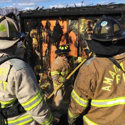 Firefighters surveyed the damage after a fire broke out at Lazy Point Thursday morning. Firefighters surveyed the damage after a fire broke out at Lazy Point Thursday morning.