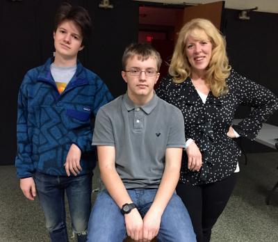 Dylan Breault, center, is a senior at Bridgehampton High School whose play, "Hoping for Change," will be produced on Saturday through the Young Artists and Writers Project High School Playwriting Program. He is pictured with his friend and co-star, Milo Youngerman, at left, and Valerie DiLorenzo, right, the director of the play.