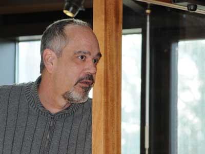 Len Bernard, listening during a 2011 town board meeting, will stay on as East Hampton Town's budget chief. Len Bernard, listening during a 2011 town board meeting, will stay on as East Hampton Town's budget chief.