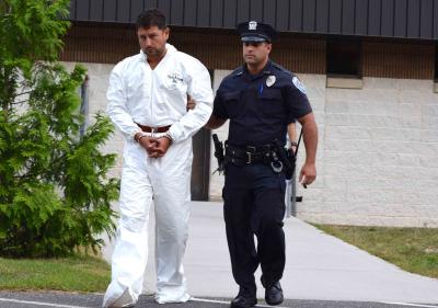 Sean P. Ludwick, a major real estate developer in Manhattan, was led out of the Southampton Town Police Department for his arraignment on Monday. He is accused of driving drunk in a crash that left his passenger, Paul Hansen, dead. Sean P. Ludwick, a major real estate developer in Manhattan, was led out of the Southampton Town Police Department for his arraignment on Monday. He is accused of driving drunk in a crash that left his passenger, Paul Hansen, dead.