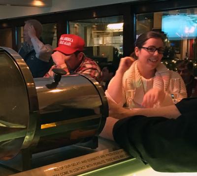 Trump supporters may not be gathering for get-out-the-vote events, but they are here. Above, bar patron wore cap bearing Trump's campaign slogan, "Make America Great Again." Trump supporters may not be gathering for get-out-the-vote events, but they are here. Above, bar patron wore cap bearing Trump's campaign slogan, "Make America Great Again."