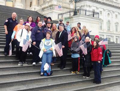 Representative Peter King, center, with a group of Long Island residents and people involved with the post-Sandy restoration effort who traveled to Washington on Tuesday for the House of Representative's vote on a $50.7 billion hurricane relief package. Representative Peter King, center, with a group of Long Island residents and people involved with the post-Sandy restoration effort who traveled to Washington on Tuesday for the House of Representative's vote on a $50.7 billion hurricane relief package.