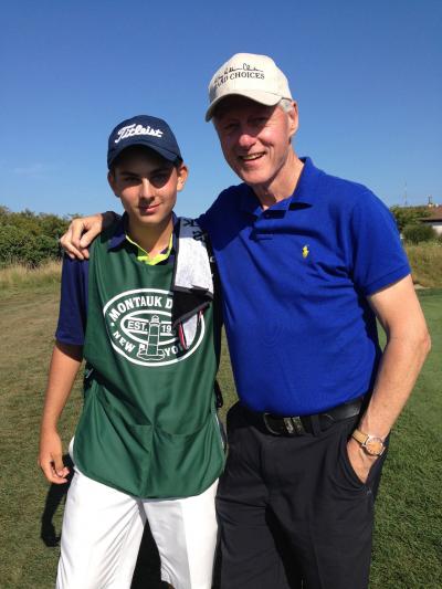 Kolbein Finsnes, a 15-year-old caddy at Montauk Downs, was one of the caddies for President Bill Clinton when he golfed there on Aug. 20. Kolbein Finsnes, a 15-year-old caddy at Montauk Downs, was one of the caddies for President Bill Clinton when he golfed there on Aug. 20.