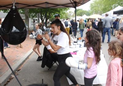 Newtown Lane in East Hampton was filled with visitors last year during a first-ever street fair. The fair will return on May 12. Newtown Lane in East Hampton was filled with visitors last year during a first-ever street fair. The fair will return on May 12.
