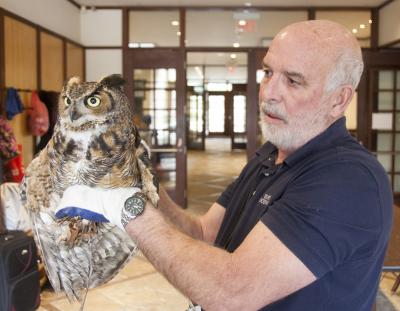 Greg Drossel and two maintenance crew members at the Ross School rescued a great horned owl on Thursday morning after it got caught in a soccer net on the athletic field.