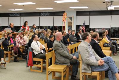 A crowd of more than 30 people gathered for the forum in the Pierson library on Thursday.