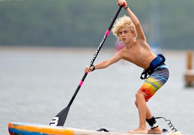Jameson Roeber, 8, of Port Jefferson, won Paddle for Pink’s quarter-mile kids race “by a mile,” according to one observer. Below, Helen Gifford and Jennifer Ford were the tandem winners. “Teamwork and camaraderie” saw them through, Ford said. Jameson Roeber, 8, of Port Jefferson, won Paddle for Pink’s quarter-mile kids race “by a mile,” according to one observer. Below, Helen Gifford and Jennifer Ford were the tandem winners. “Teamwork and camaraderie” saw them through, Ford said.