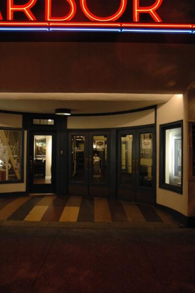 The Sag Harbor Cinema's neon sign and semicircular alcove helped to define the streetscape of the village. The Sag Harbor Cinema's neon sign and semicircular alcove helped to define the streetscape of the village.