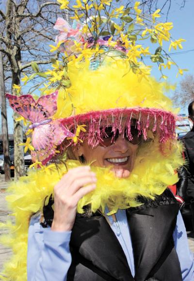 Participants in the Sag Harbor Chamber of Commerce’s Easter Bonnet Parade on Saturday vied to top (pun intended) each other with the zaniest creations. Above, the feathers in Heidi Swindells’s bonnet matched the fresh forsythia sprouting from it. Below, Melanie Pineda cozied up to the Easter Bunny. Participants in the Sag Harbor Chamber of Commerce’s Easter Bonnet Parade on Saturday vied to top (pun intended) each other with the zaniest creations. Above, the feathers in Heidi Swindells’s bonnet matched the fresh forsythia sprouting from it. Below, Melanie Pineda cozied up to the Easter Bunny.