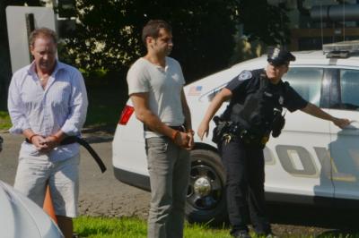 Chris W. Layton, left, and Sahm Adrangi, center, appeared in East Hampton Town Justice Court on Saturday following their drunken driving arrests. Chris W. Layton, left, and Sahm Adrangi, center, appeared in East Hampton Town Justice Court on Saturday following their drunken driving arrests.