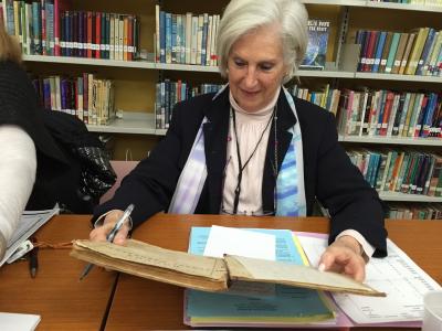 Eleanor Tritt, the Amagansett School superintendent, checked out a geography textbook from 1863 that once belonged to a student at the original Amagansett School, which was moved to the current school grounds recently. Eleanor Tritt, the Amagansett School superintendent, checked out a geography textbook from 1863 that once belonged to a student at the original Amagansett School, which was moved to the current school grounds recently.